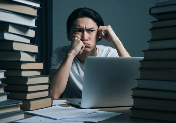 Student overwhelmed by academic stress