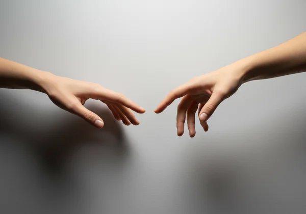 Person reaching out for professional mental health help